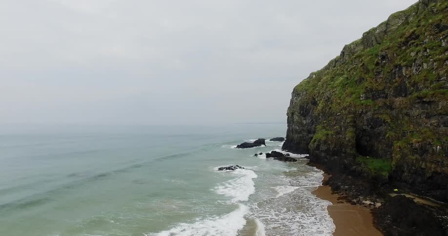 Ocean waves wash ashore a beach