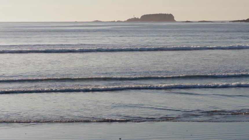 Ocean waves are flowing in on beach