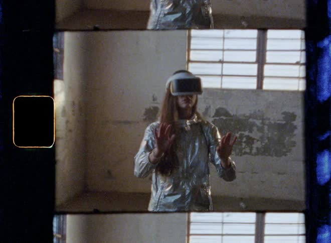 Woman wearing virtual reality headset is walking in empty building