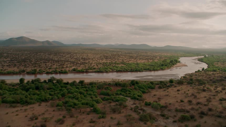 A river flows through a rural landscape