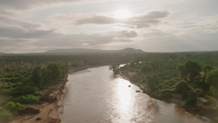 Sunlight shines on a rural river