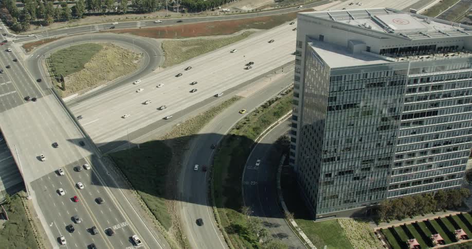 Vehicles travel down a highway road