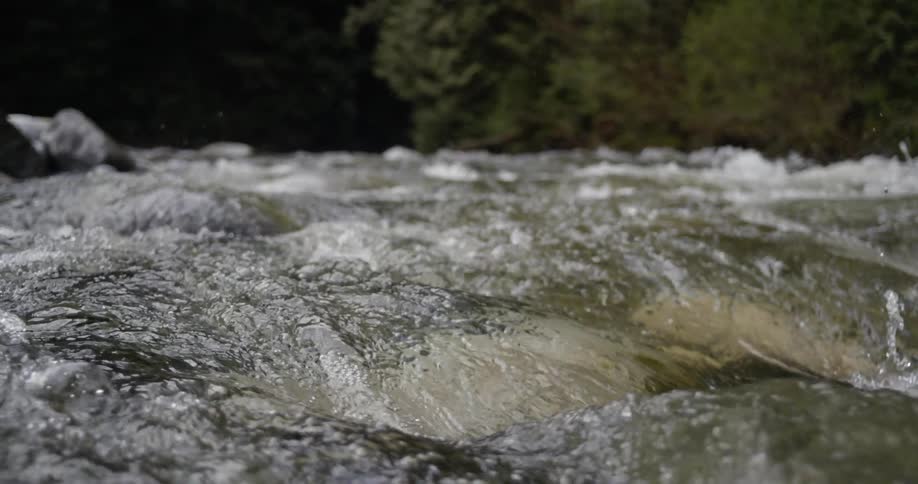 Water splashing as it flows down a river