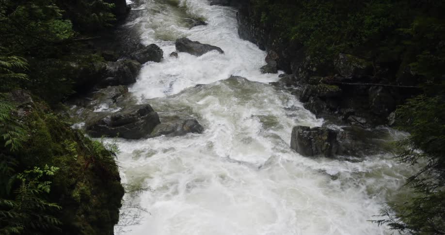 Large rocks fill the rapids below