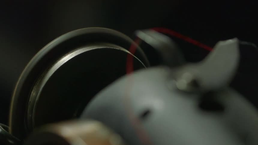 Sewing machine wheel spins rapidly