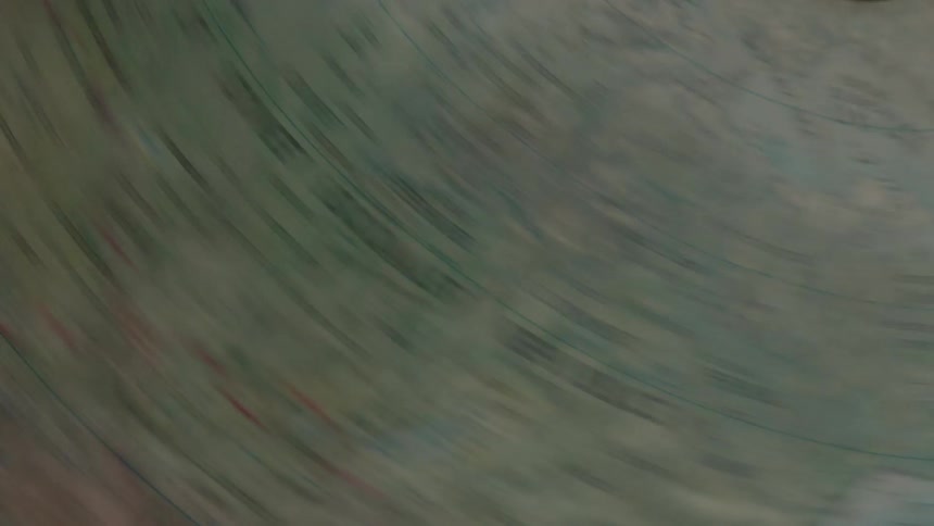 A globe spins around rapidly then stops