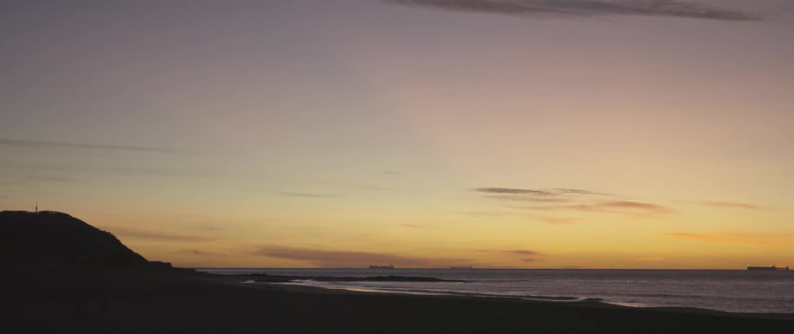 The sea is shown during a sunset