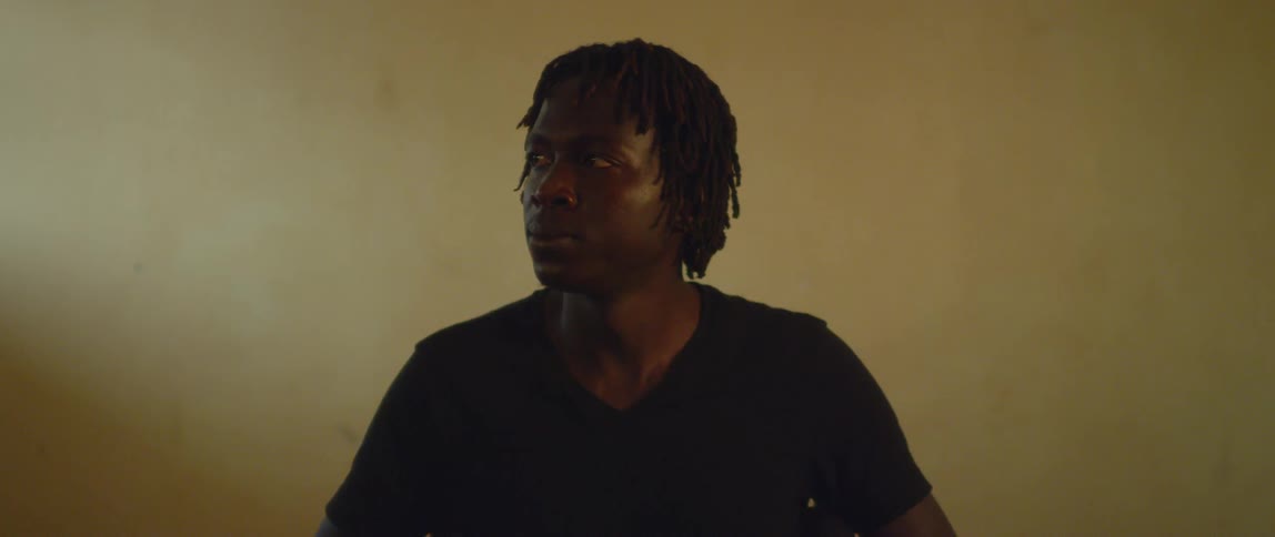 A man stares to his side