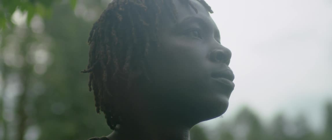 A person looks around outside