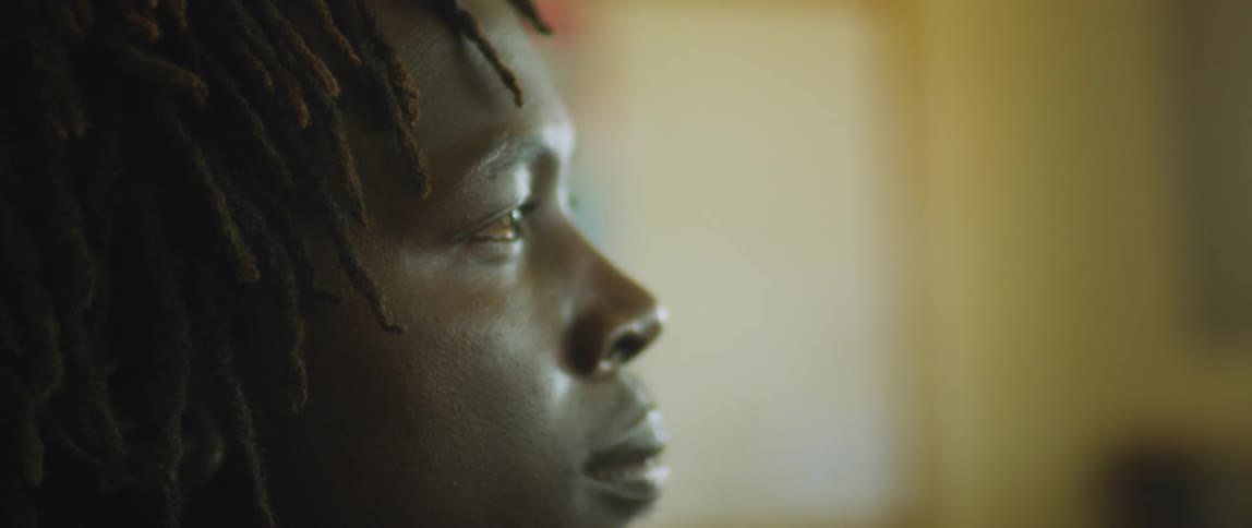 A man looks around while indoors