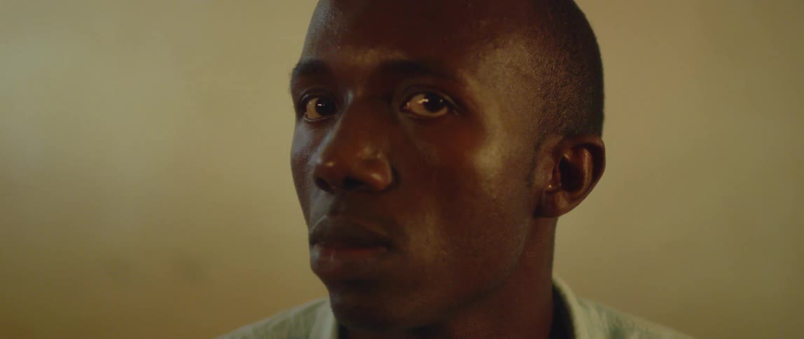 A man turns his head looking forward