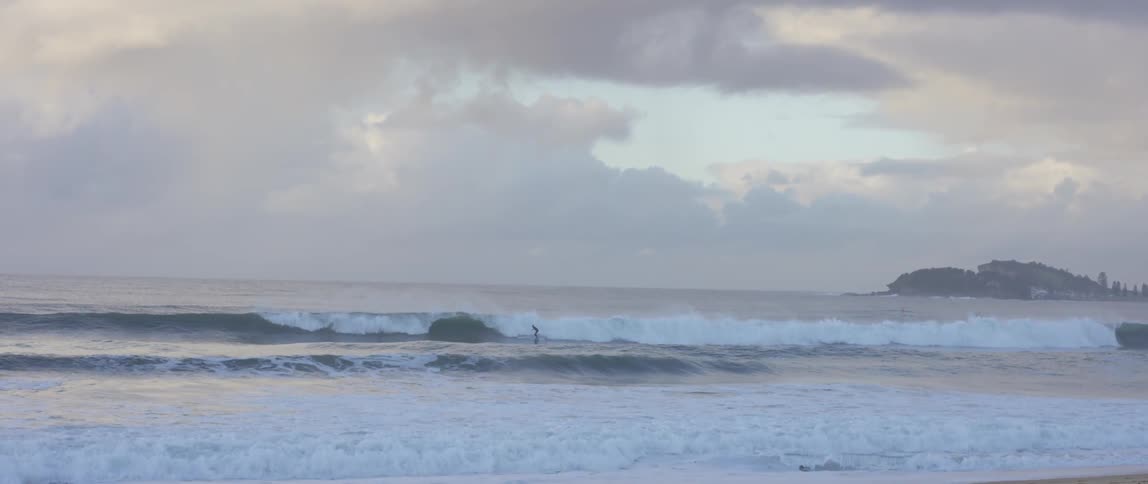 A person riding some waves