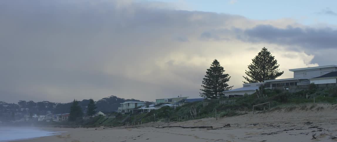 The beach is quiet at dusk