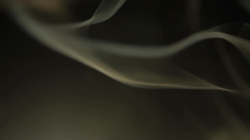 Ribbons of smoke curl and float