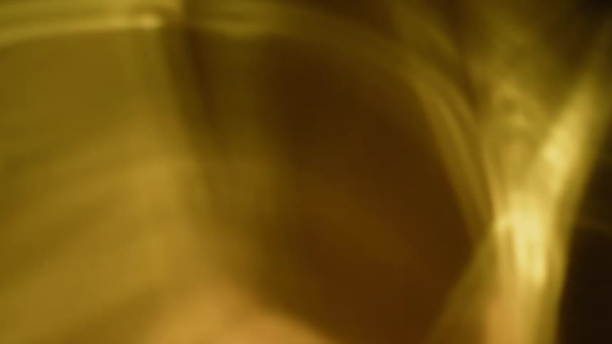 Yellow light reflection is swirled around