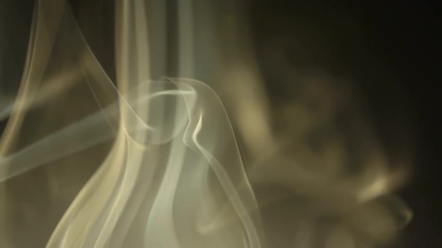 Smoke swirls in the air