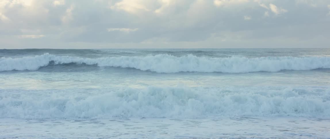 Waves are crashing in at high tide