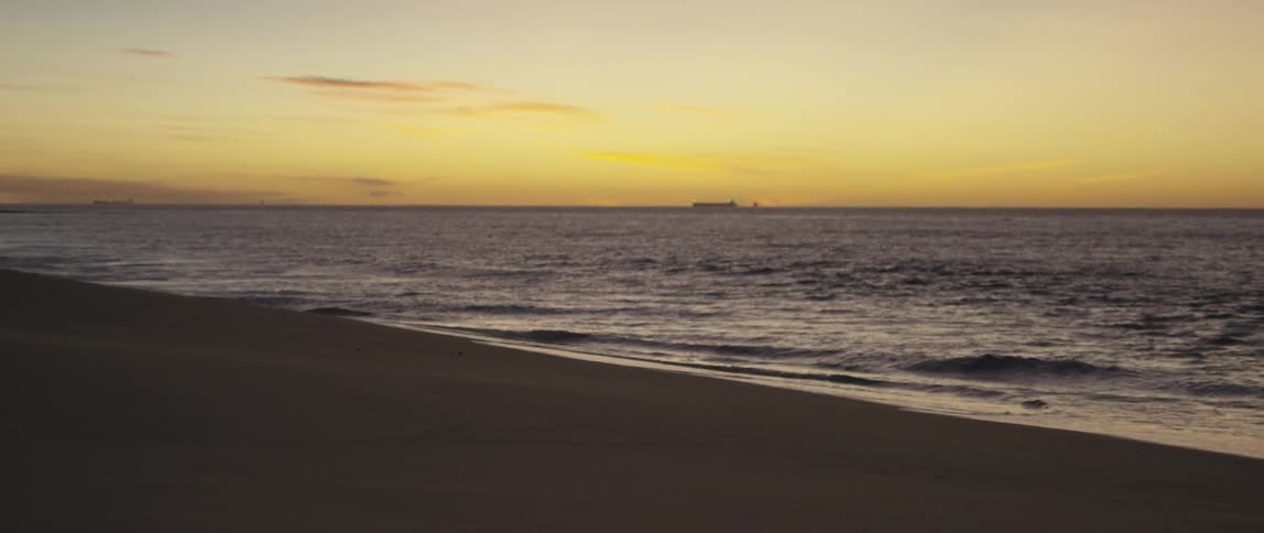 View of a empty beach at sunset
