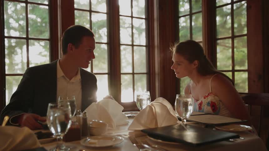 A couple is having dinner