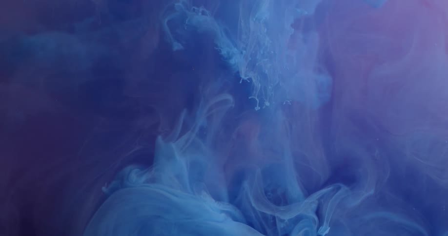 Blue haze flows through liquid