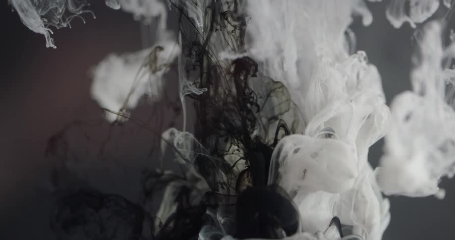 White and black liquid mix together