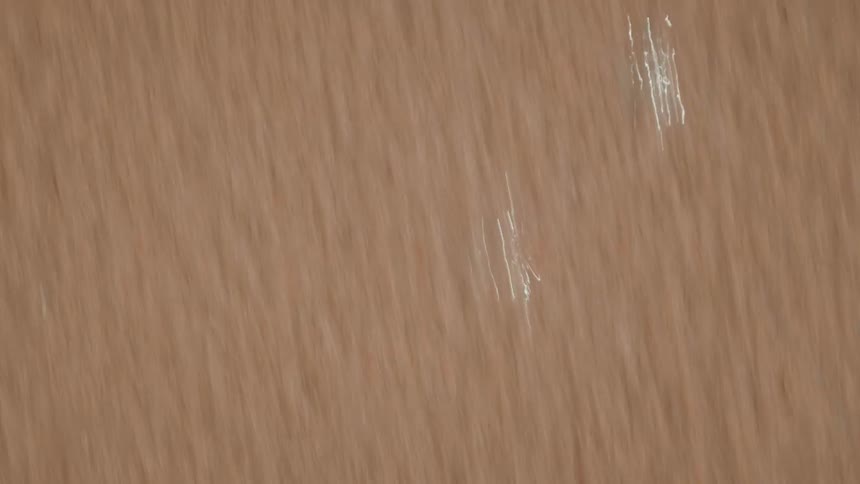 Shallow water with sand underneath