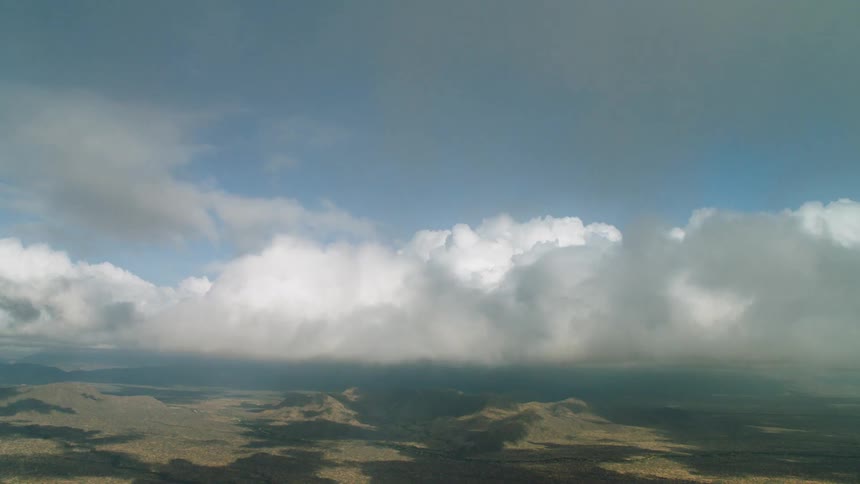 Thick clouds moving over mountain wilderness