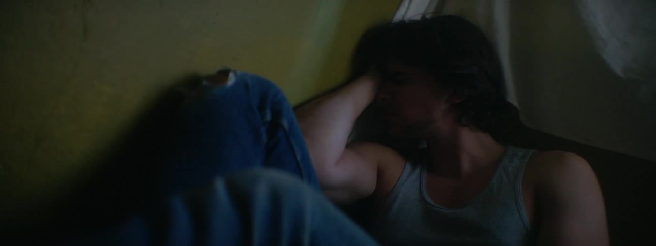 A man is lying on the floor
