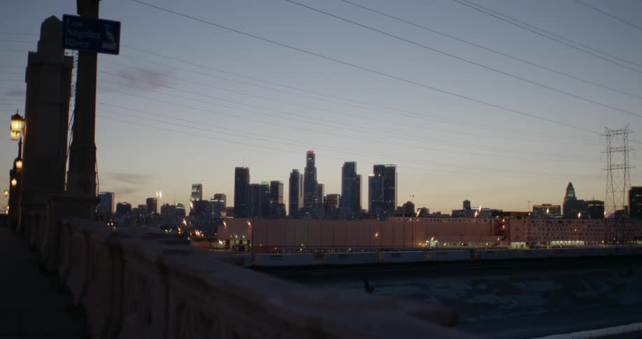 Large city tall buildings at sunset