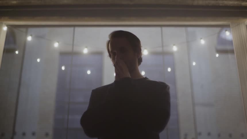 A man stands in a museum