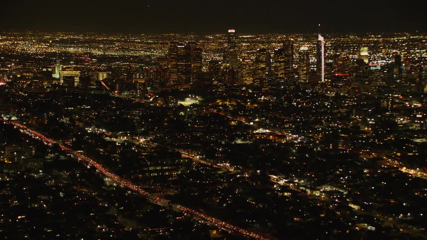 City lights illuminate the night sky