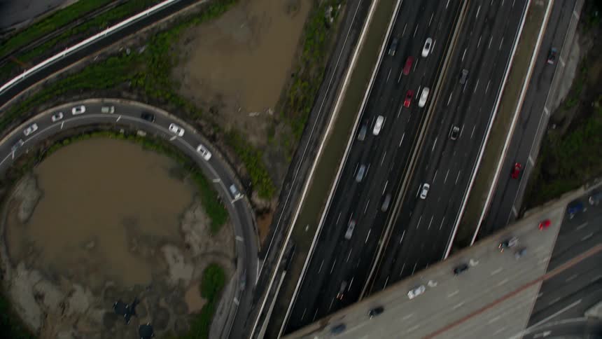 Cars drive on a city highway