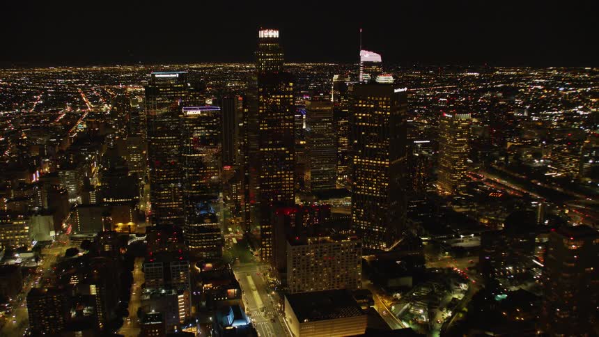 Skyscrapers stand in a city at night
