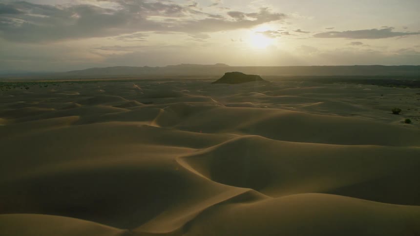Sand dunes cover the landscape