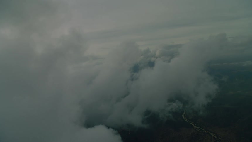 White clouds rotate above the landscape