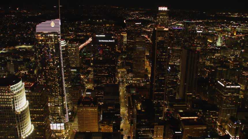 Flying through skyscrapers at night in Los Angeles