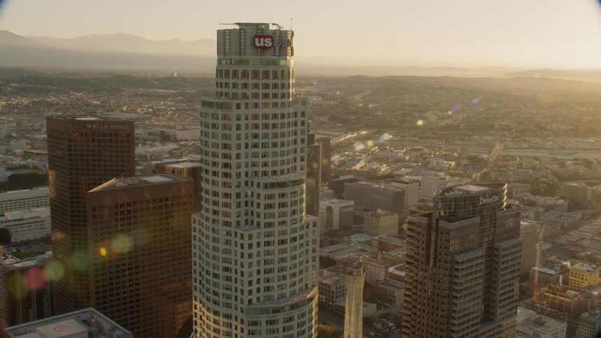 US Bank Tower glows gold at sunrise in DTLA