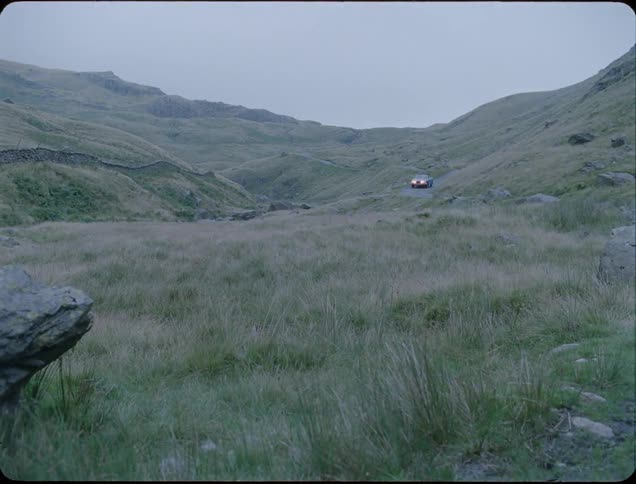 A car is driven in mountains