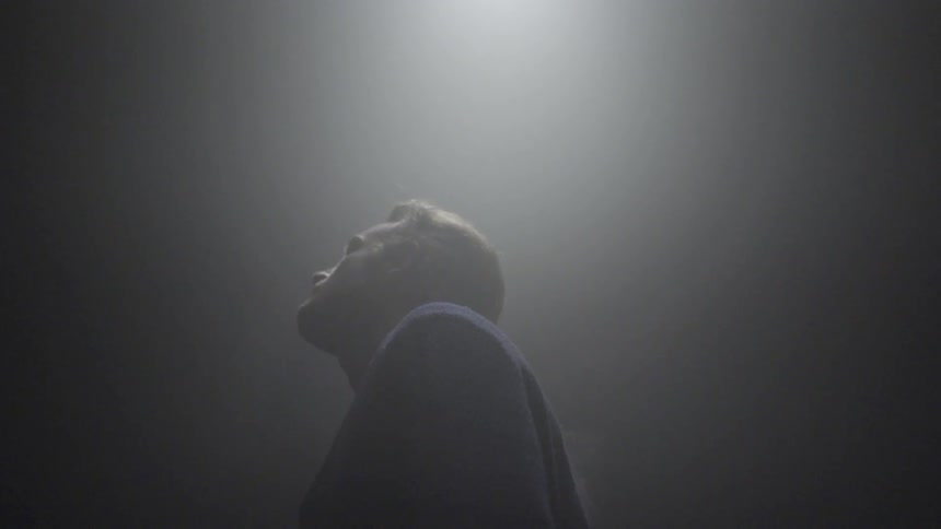Smoke emerging from a man's back