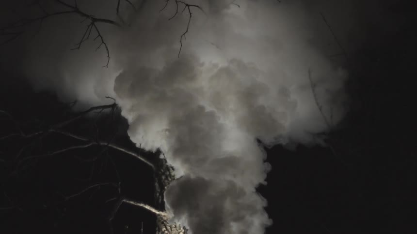 Smoke rising heavily into the sky