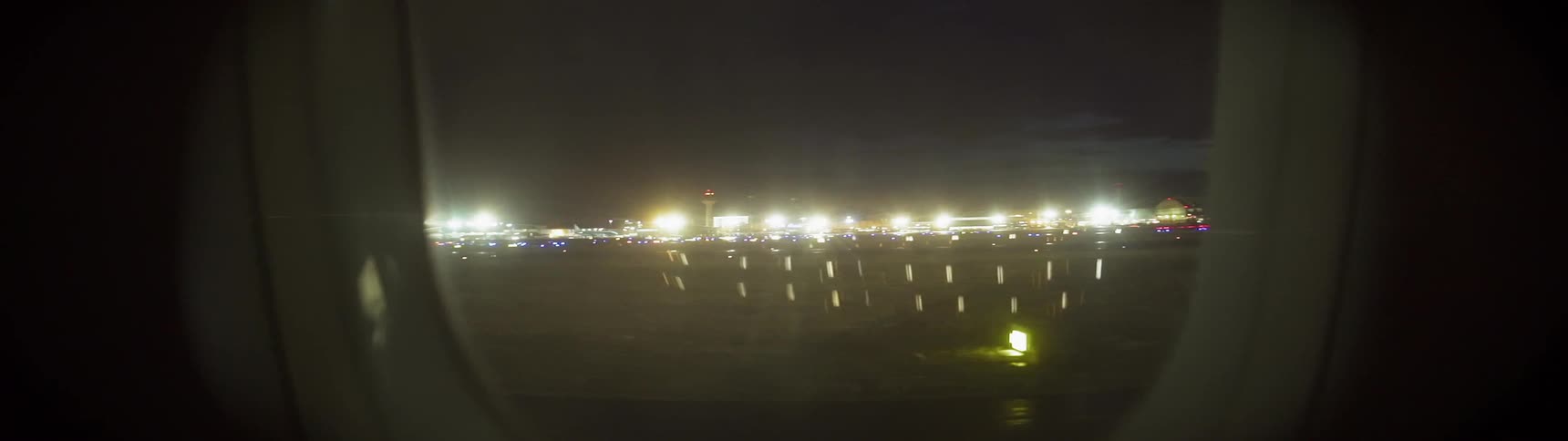 Jet on a runway at night