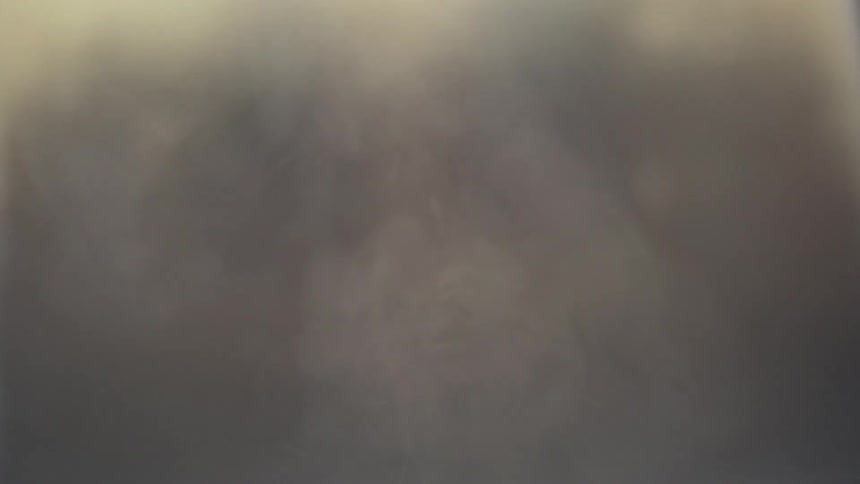 Steam rising from a tea kettle