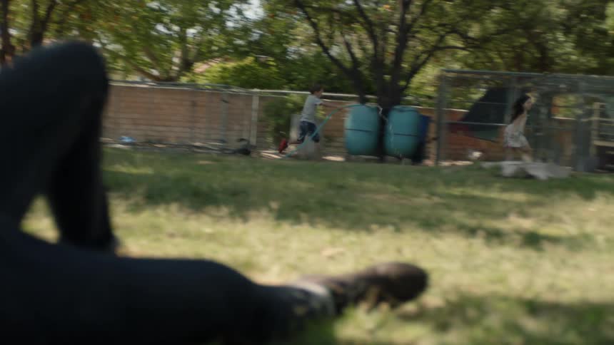 Children running in the grass