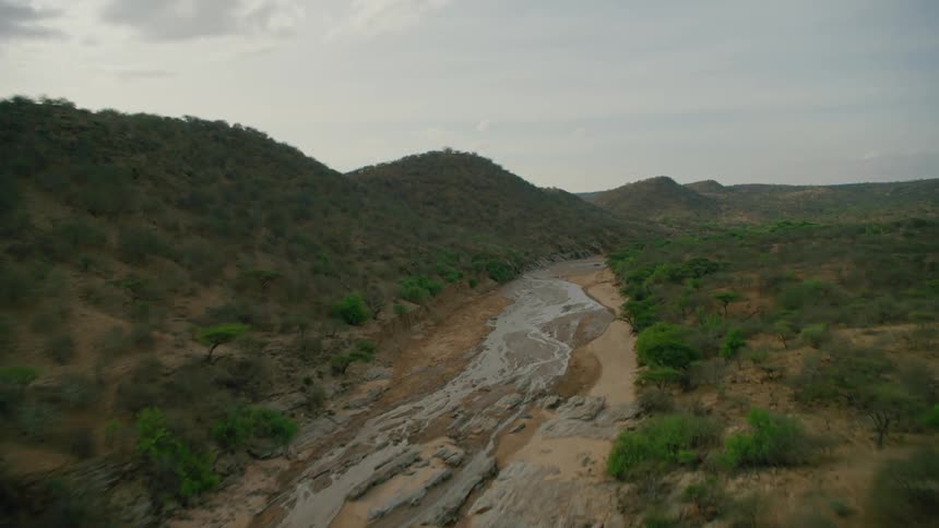 A river flows through a rural landscape