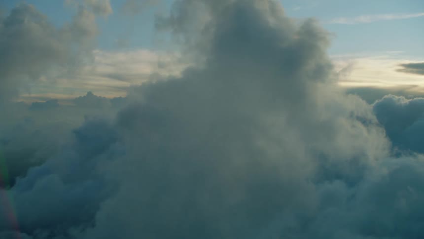 Flying through wispy clouds