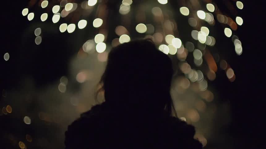 Someone is watching fireworks explode