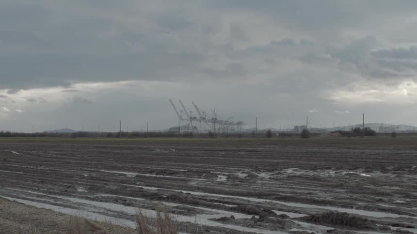 Clouds float over a rural landscape
