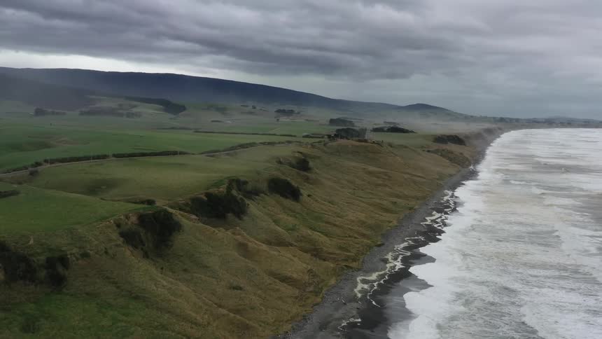 Ocean waves flow towards the shoreline