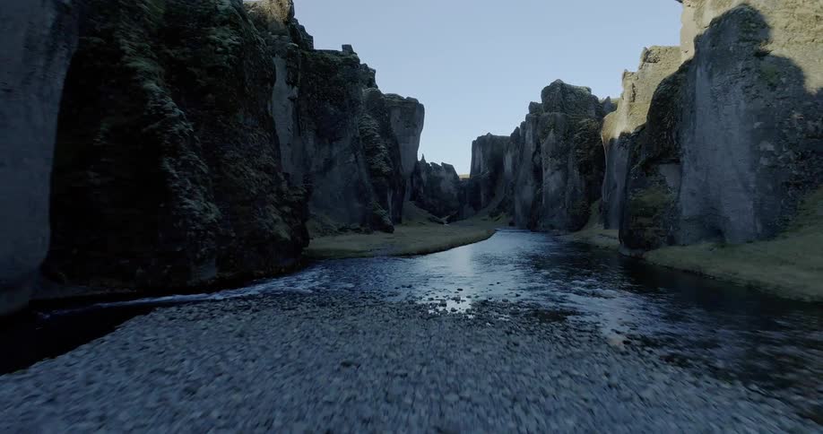 A river flows through a canyon