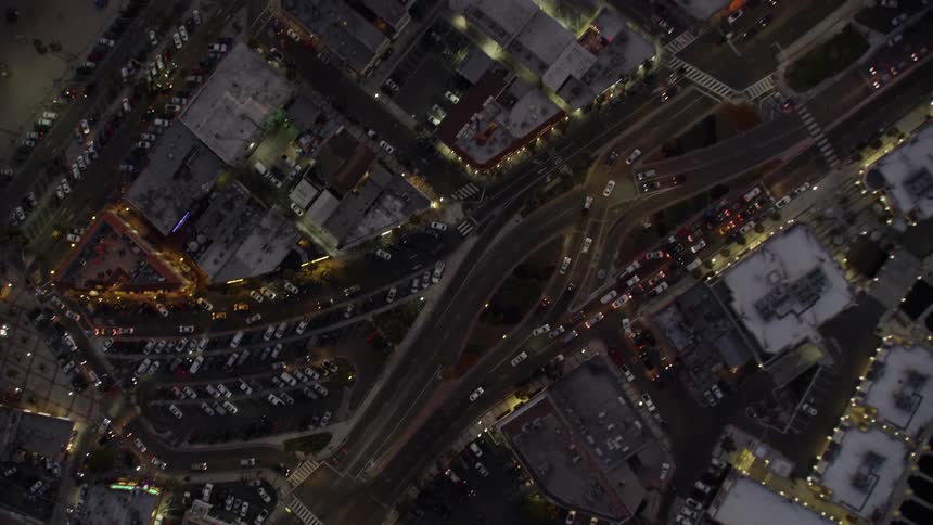 Cars travel on city streets and highways